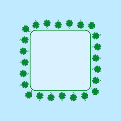 Square frame with green four-leaf clovers