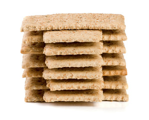 stack of grain crispbreads isolated on white background