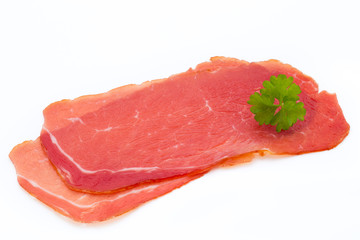 Pork ham slices isolated on white background.
