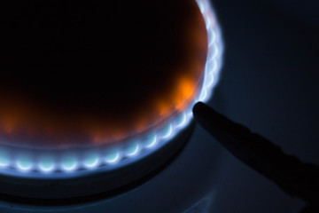 Burning burner gas stove at home.