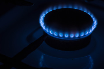 Burning burner gas stove at home.