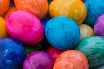 Easter eggs painted in colors on a white background.