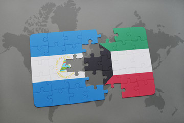 puzzle with the national flag of nicaragua and kuwait on a world map
