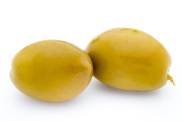 Green big olives on the white background.
