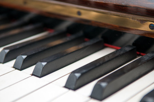 Close up of dusty keys of a piano keyboard