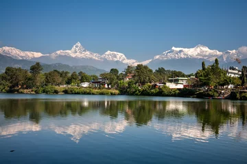 Peel and stick wall murals Annapurna View at Annapurna mountain range and its reflection in Phewa lake in Pokhara, Nepal