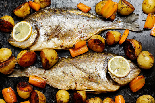 Baked Dorado fish with vegetables