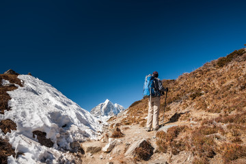 Trekker in Khumbu valley on a way to Everest Base camp