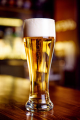 A glass of beer on counter