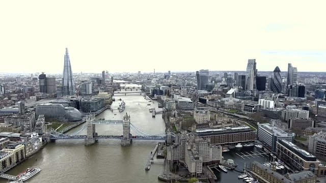 Aerial View Iconic Landmarks and Cityscape of London feat. Tower Bridge, Tower of London, City Hall, River Thames, The Shard Building, City of London Financial District and Skycrapers in 4K UHD