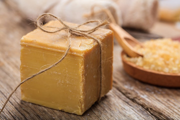 Handmade soap bar on wooden background
