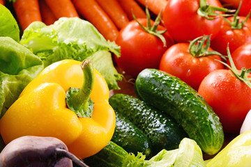 Composition with variety of fresh organic vegetables and fruits