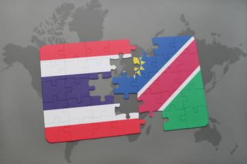 puzzle with the national flag of thailand and namibia on a world map