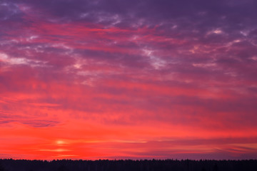 Beautiful fiery orange sky during sunset or sunrise.