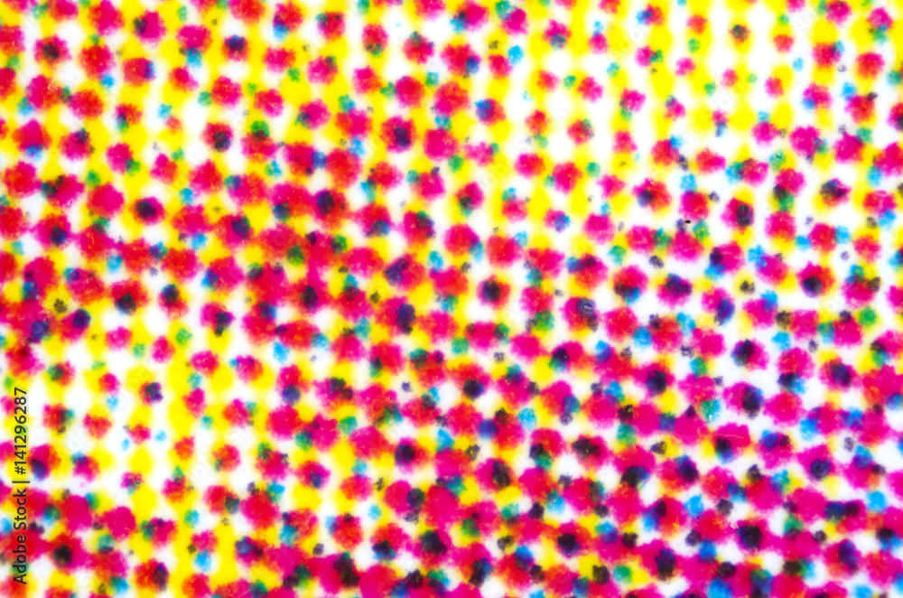 Poster four color printing on white paper under the microscope. cmyk cyan magenta yellow and key or black c