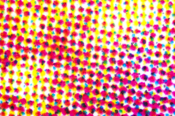 Four color printing on white paper under the microscope. CMYK Cyan Magenta Yellow and Key or black...