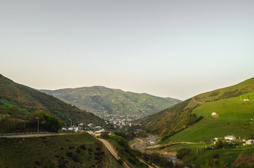 Fototapeta premium Beautiful landscape in the mountains with the sun at dawn. Mountains at the sunset time. Azerbaijan, Talish Mountains. Yardimli Masalli