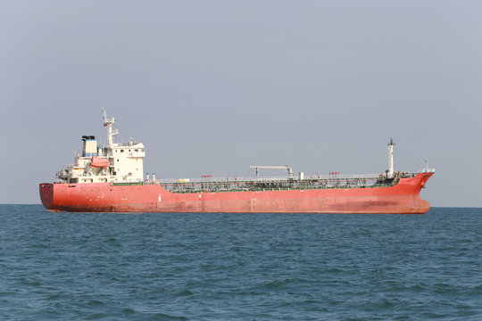 Marine cargo ship in sea.