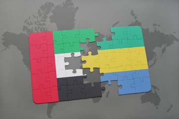 puzzle with the national flag of united arab emirates and gabon on a world map
