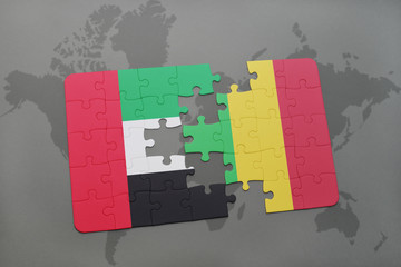 puzzle with the national flag of united arab emirates and mali on a world map