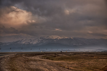 Majestic sunset in the mountains landscape. Dramatic sky clouds. Azerbaijan, Gazakh Big Caucasus