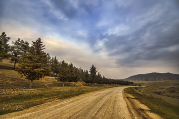 Majestic sunset in the mountains landscape. Dramatic sky clouds. Azerbaijan, Gazakh Big Caucasus