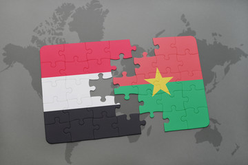 puzzle with the national flag of yemen and burkina faso on a world map