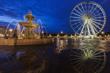 Fontaine des Fleuves and Ferris Wheel on Place de la Concorde in Paris