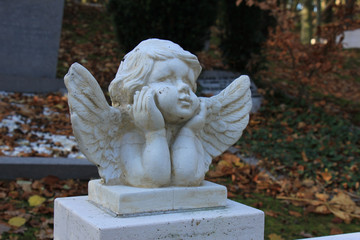 Fototapeta na wymiar Guardian angel grave ornament