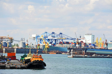 Tugboat and port cargo crane