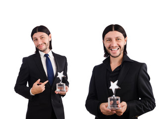 Businessman with star award isolated on white