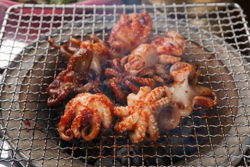 Grilled Small Octopus on a Hot Plate