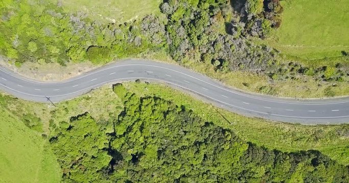 Aerial view of Green hills and road of the South Island, New Zealand