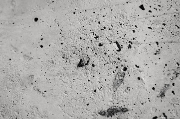 The texture of the concrete, black-and-white photo.
