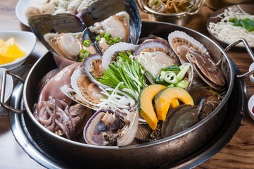 Steamed Clam. This cuisine is Korean style.