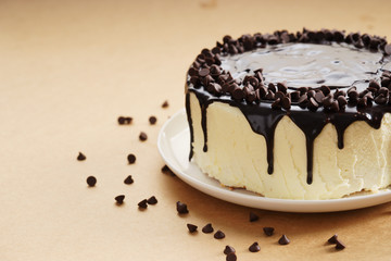 round cake with chocolate topping.