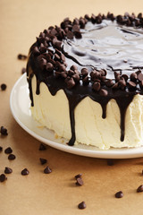 round cake with chocolate topping.