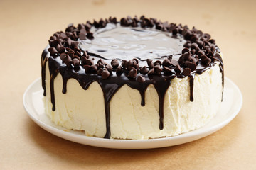 round cake with chocolate topping.