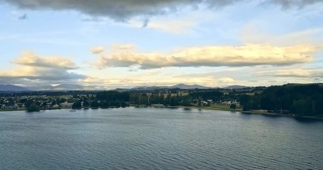 Aerial view of big lake in Te Anau at sunset, New Zealand. 