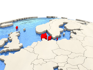 Denmark on globe with watery seas