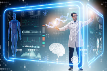 Doctor in futuristic medical concept pressing button