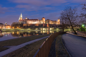 Fototapeta na wymiar Krakow, Poland, Wawel Castle and Wawel cathedral over Vistula river in the night