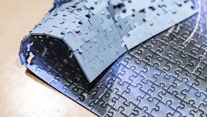 Überwerfung eines Puzzles am Rand