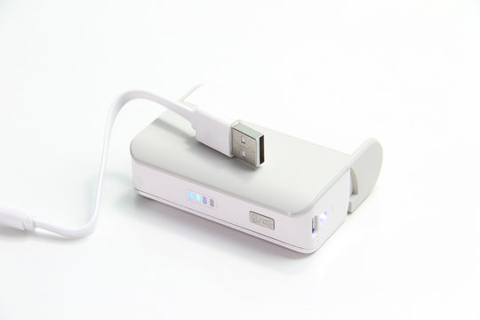 white power bank and usb charge on white background