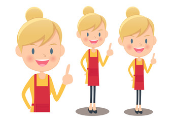 人差し指を立てるエプロン姿の欧米人女性