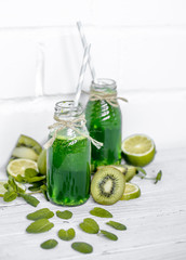 green smoothie on white background