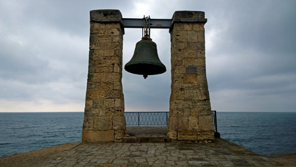 Obraz premium Fog Bell in the old town of Chersonesus Tavrichesky on the shore of the Black sea. Russia, Crimea