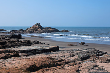 Fototapeta na wymiar Vagator beach India. rocky shore