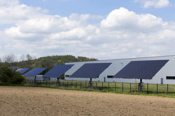 Solar Power Station on the spring Meadow 
