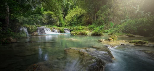 Fotobehang Natuur Deep jungle cascade in  National Park.